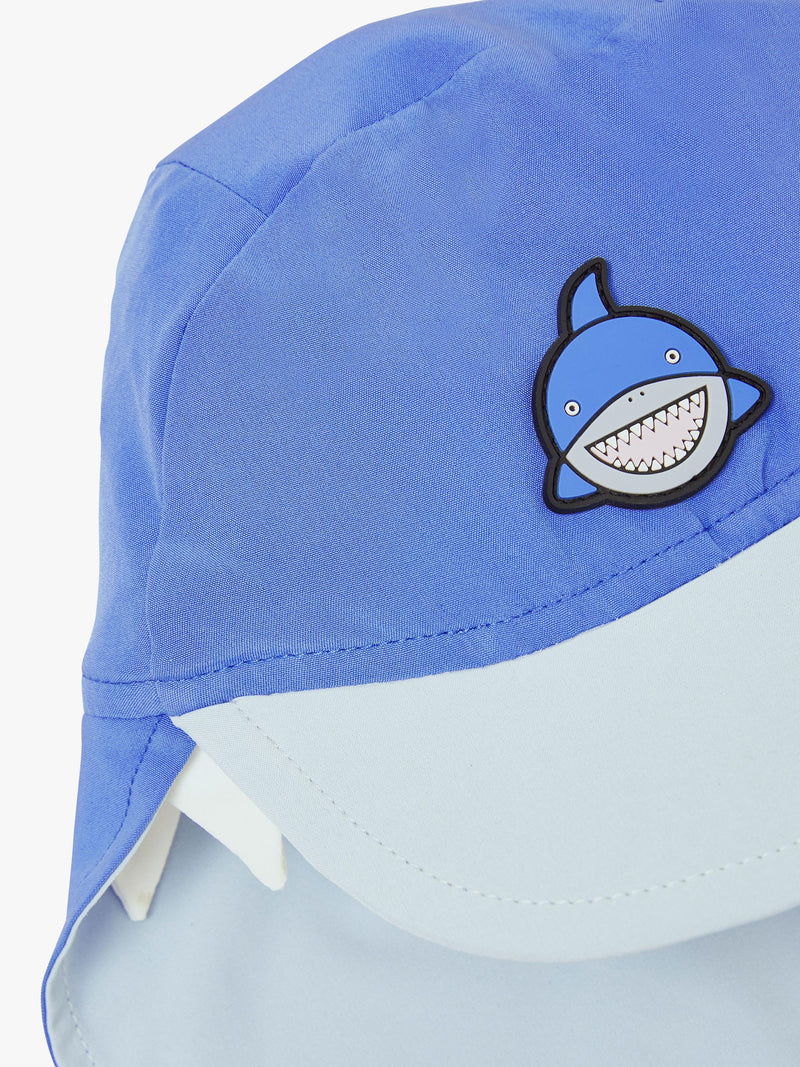 Roarsome kids' sun cap with peak and neck protector in blue, imported from the UK