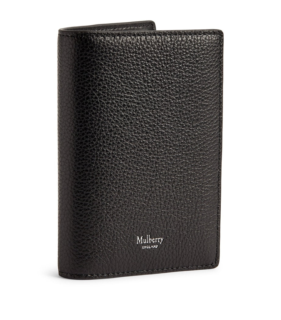 Mulberry grained leather passport holder with slimline design, imported from the UK