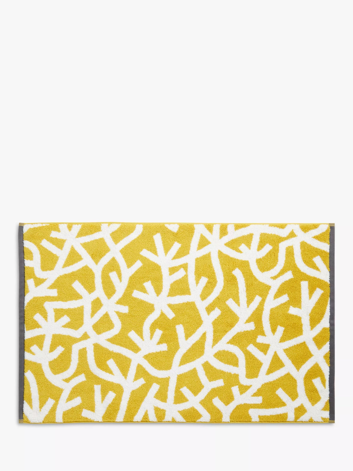 Mini Moderns cotton bath mat with forest graphic print in mustard, imported from the UK