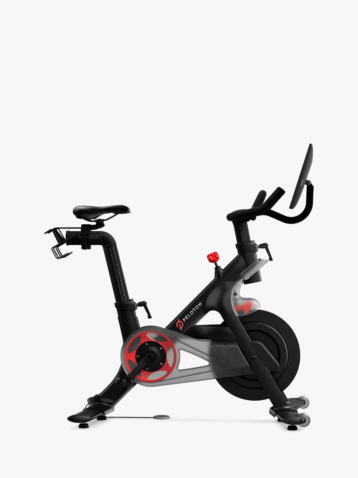Peloton indoor exercise bike with 22-inch touchscreen, imported from the UK