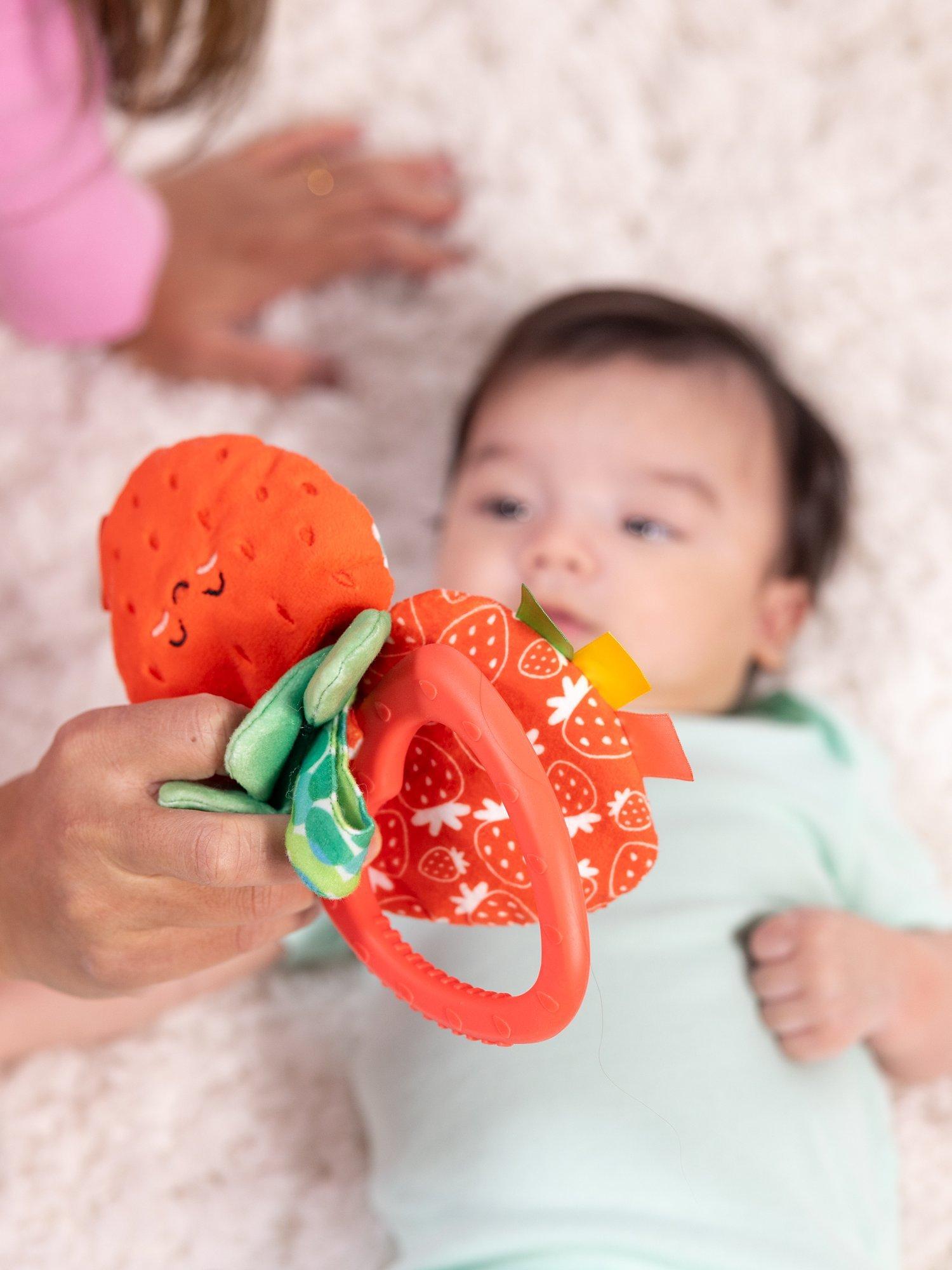 Melissa & Doug peek-a-boo strawberry take-along baby toy, imported from the UK