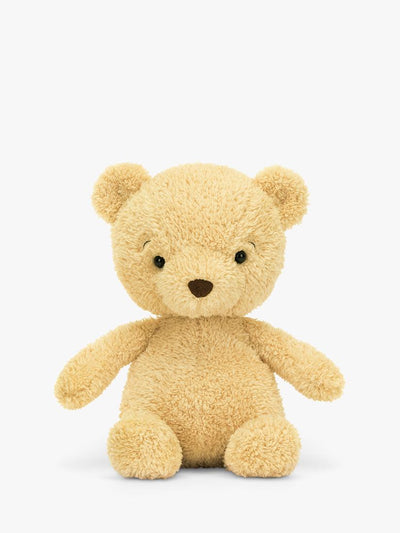 Peluche ours en fourrure jaune texturée avec nez en suédine