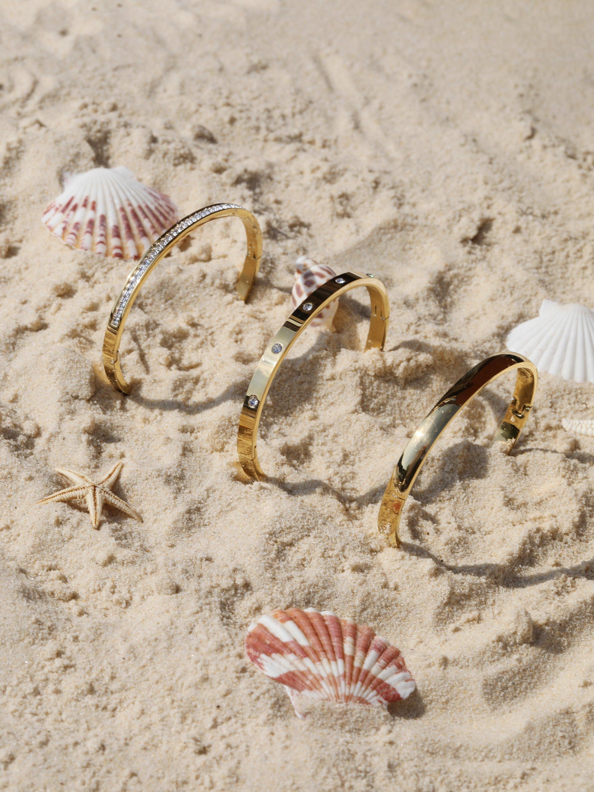 Jon Richard waterproof polished crystal bangle in gold, UK version