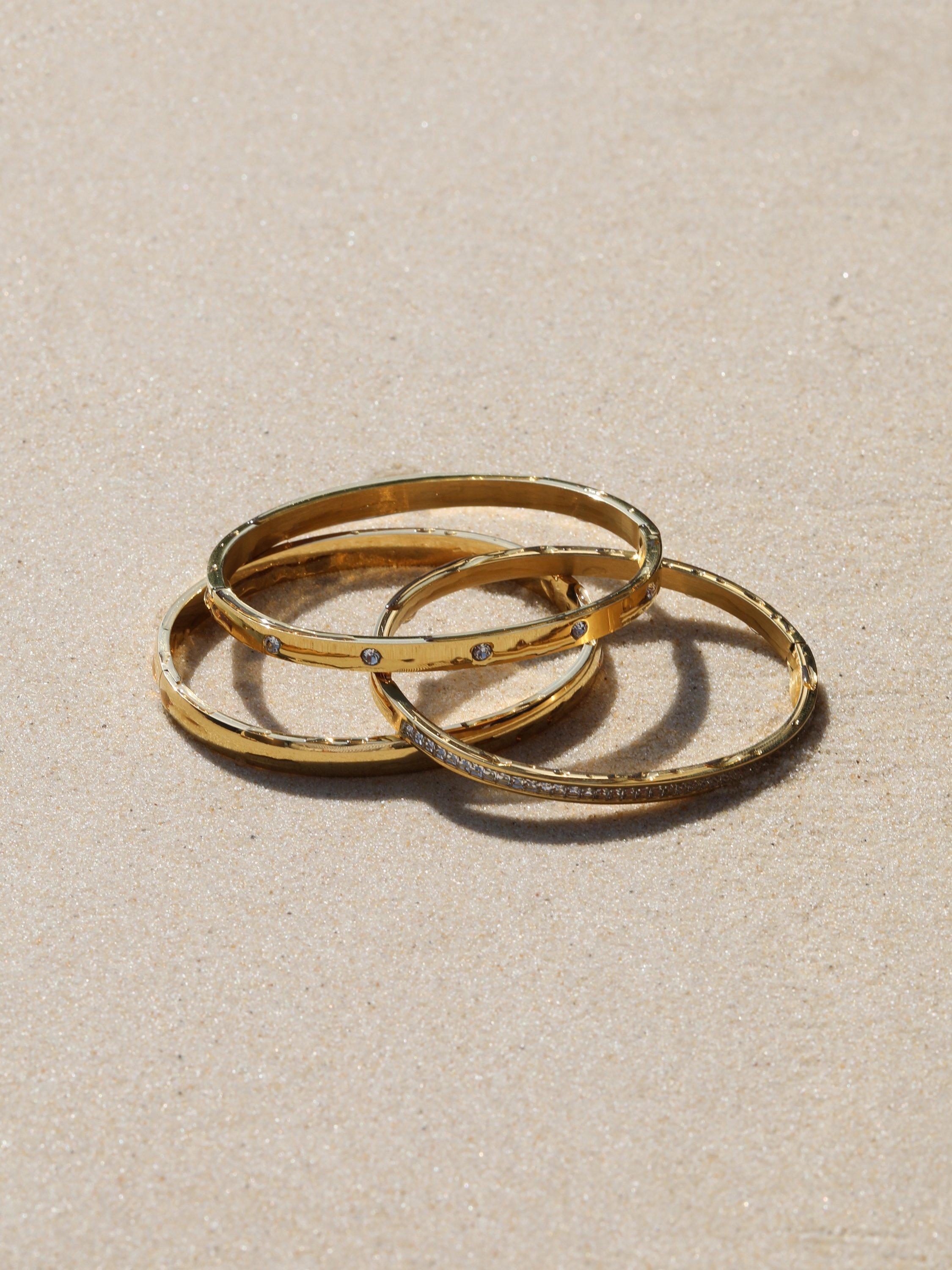 Jon Richard waterproof polished crystal bangle in gold, UK version