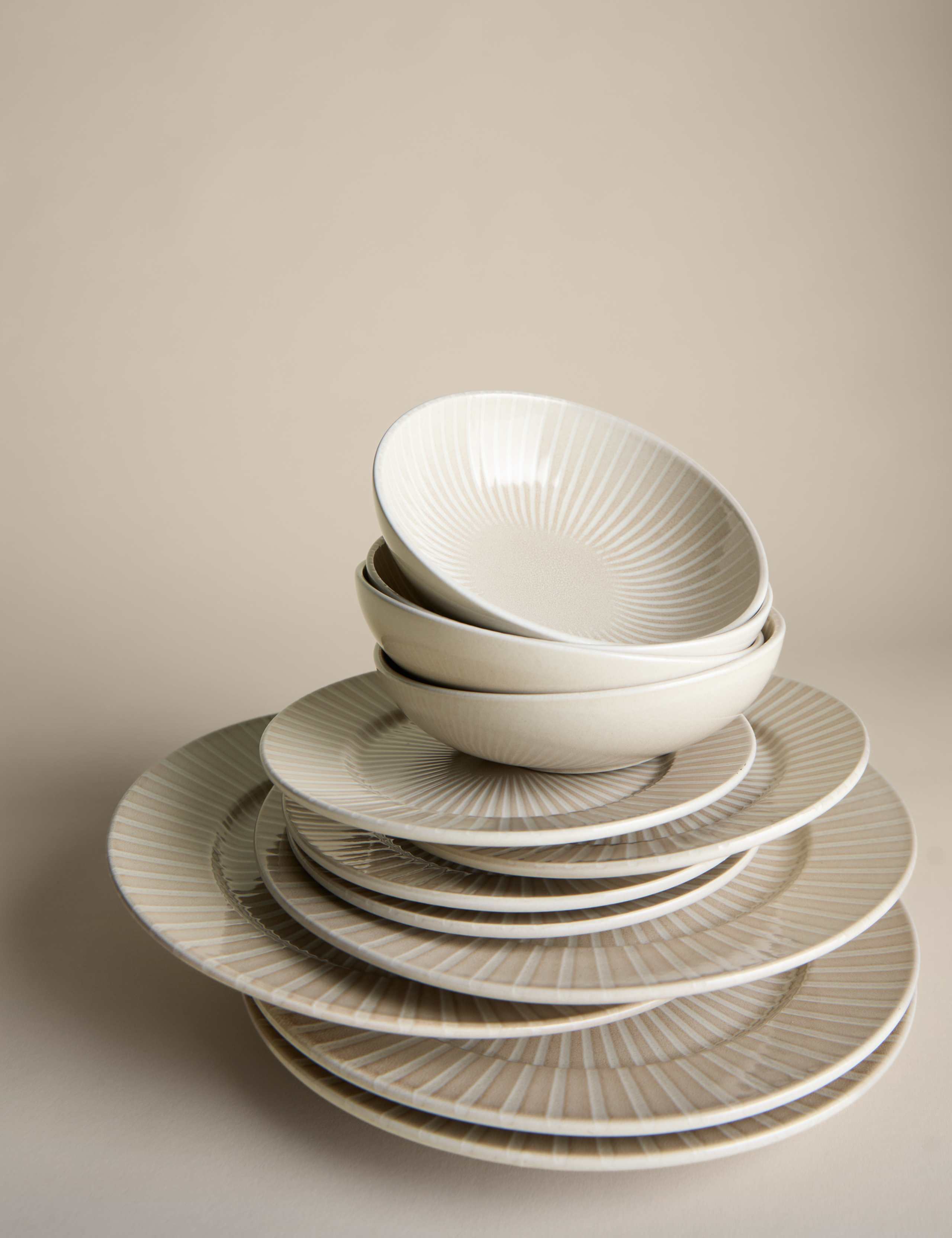 12 piece reactive striped dinner set, imported from the UK