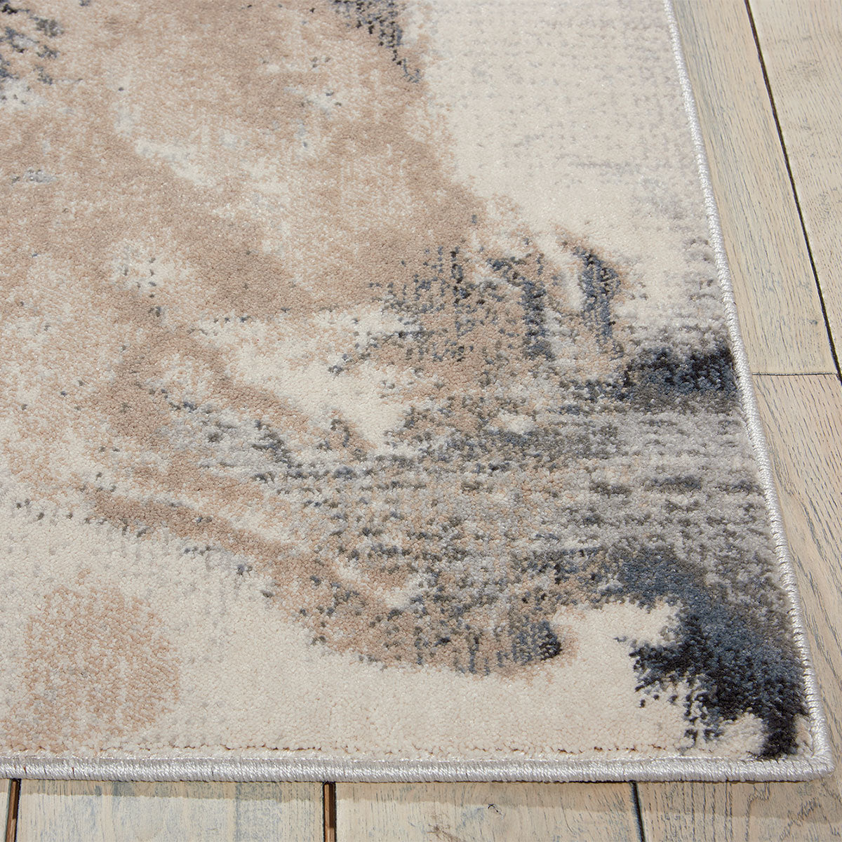 Nourison grey skies design polyester rug available in three sizes, imported from the UK