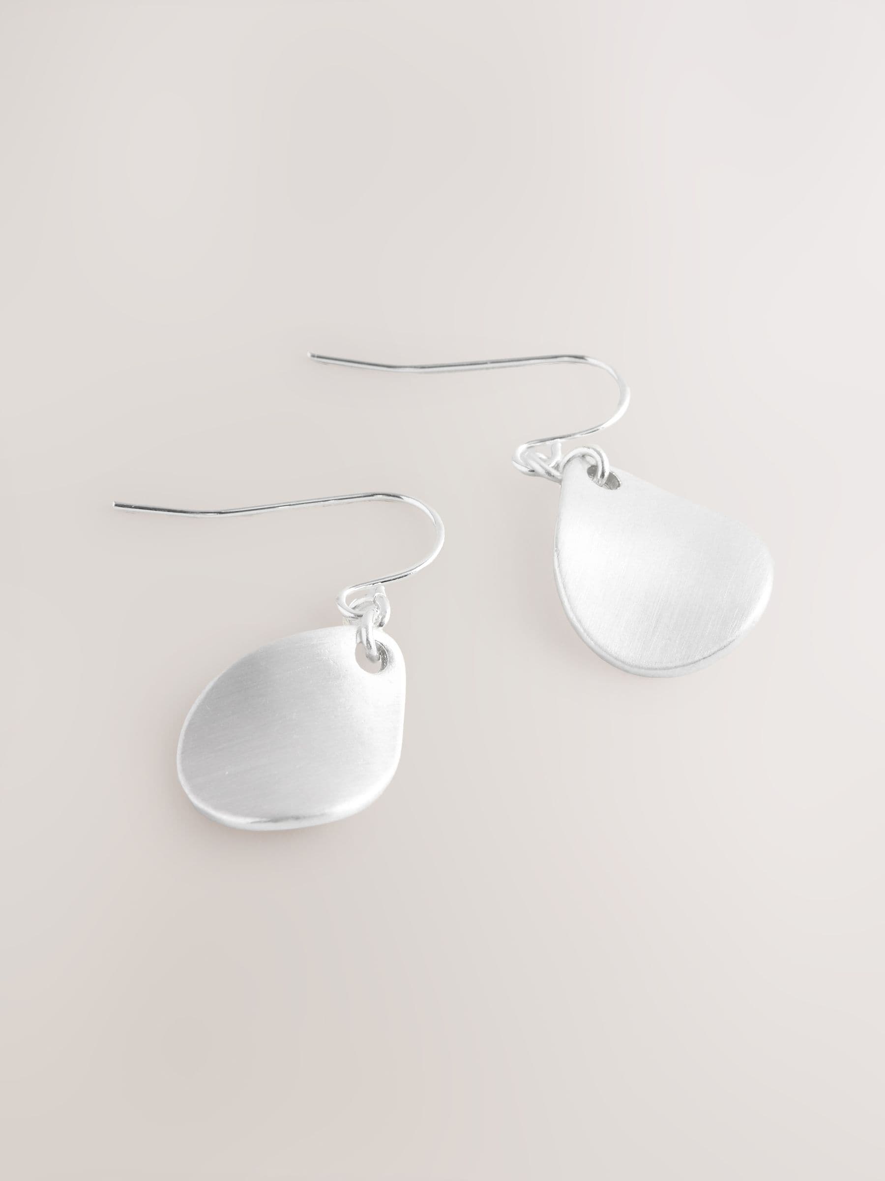 Silver tone petal drop earrings (British brand)