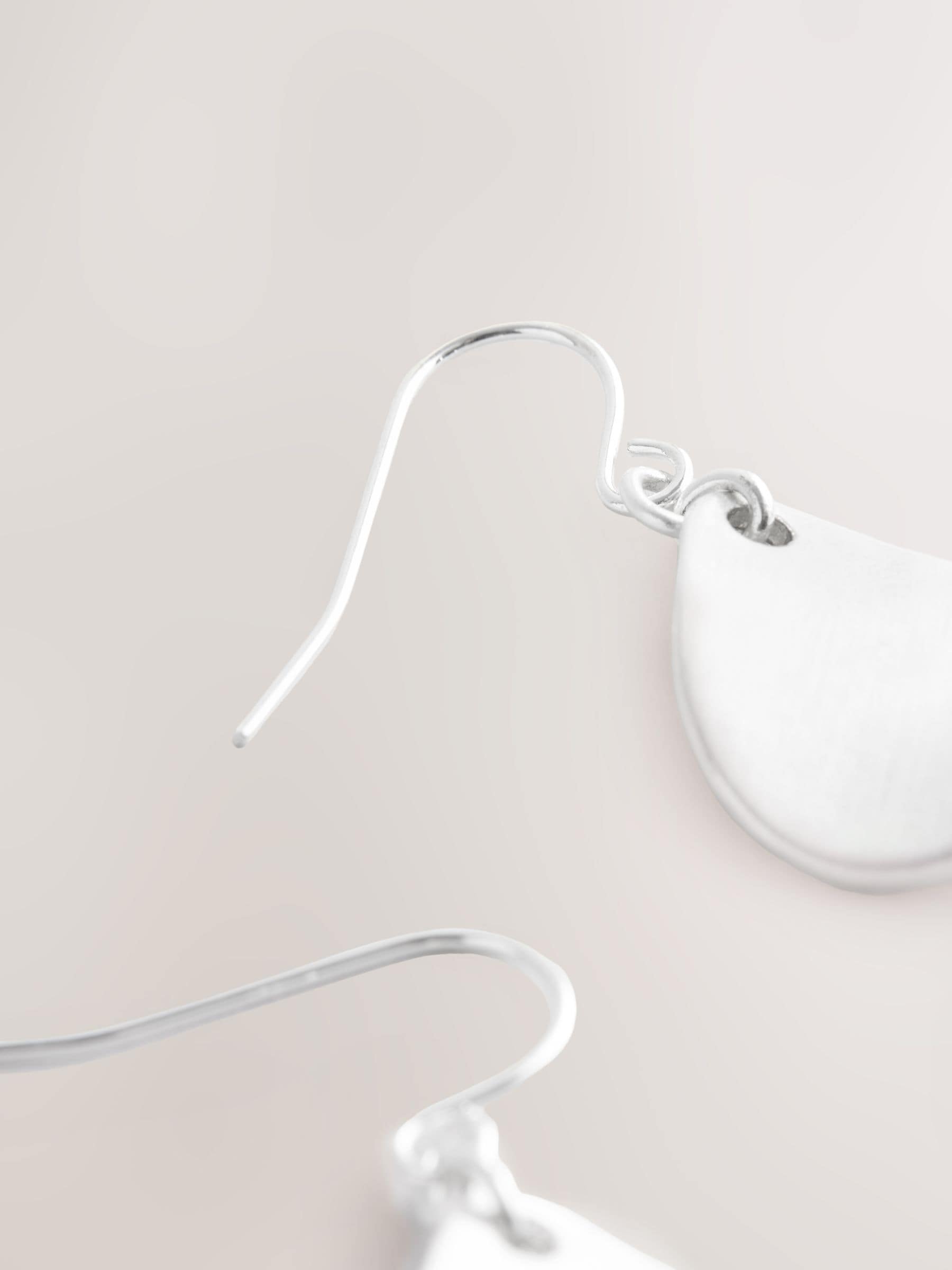 Silver tone petal drop earrings (British brand)