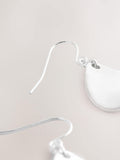 Silver tone petal drop earrings (British brand)