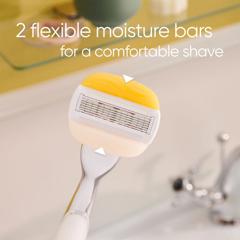 Gillette Venus Comfortglide razor with Olay bars and metal handle - British product