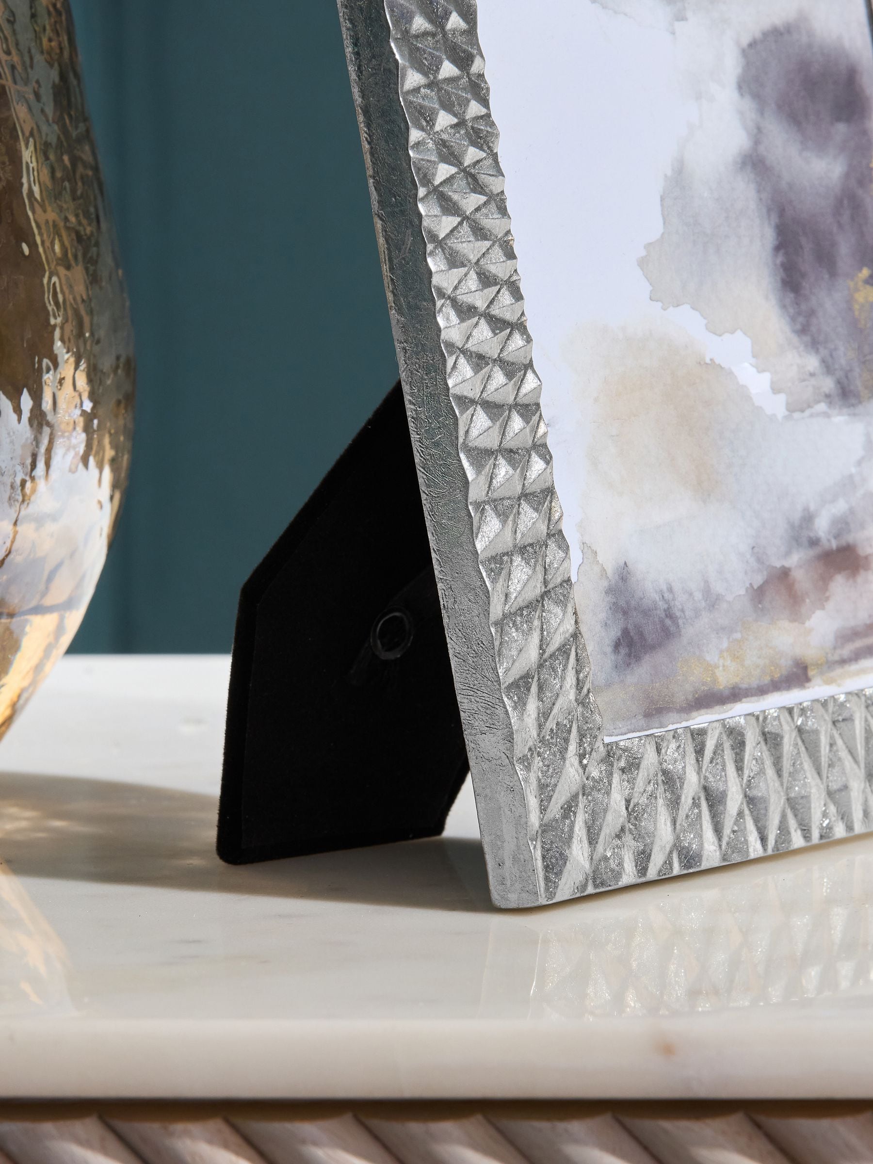 Silver geometric photo frame (British brand)