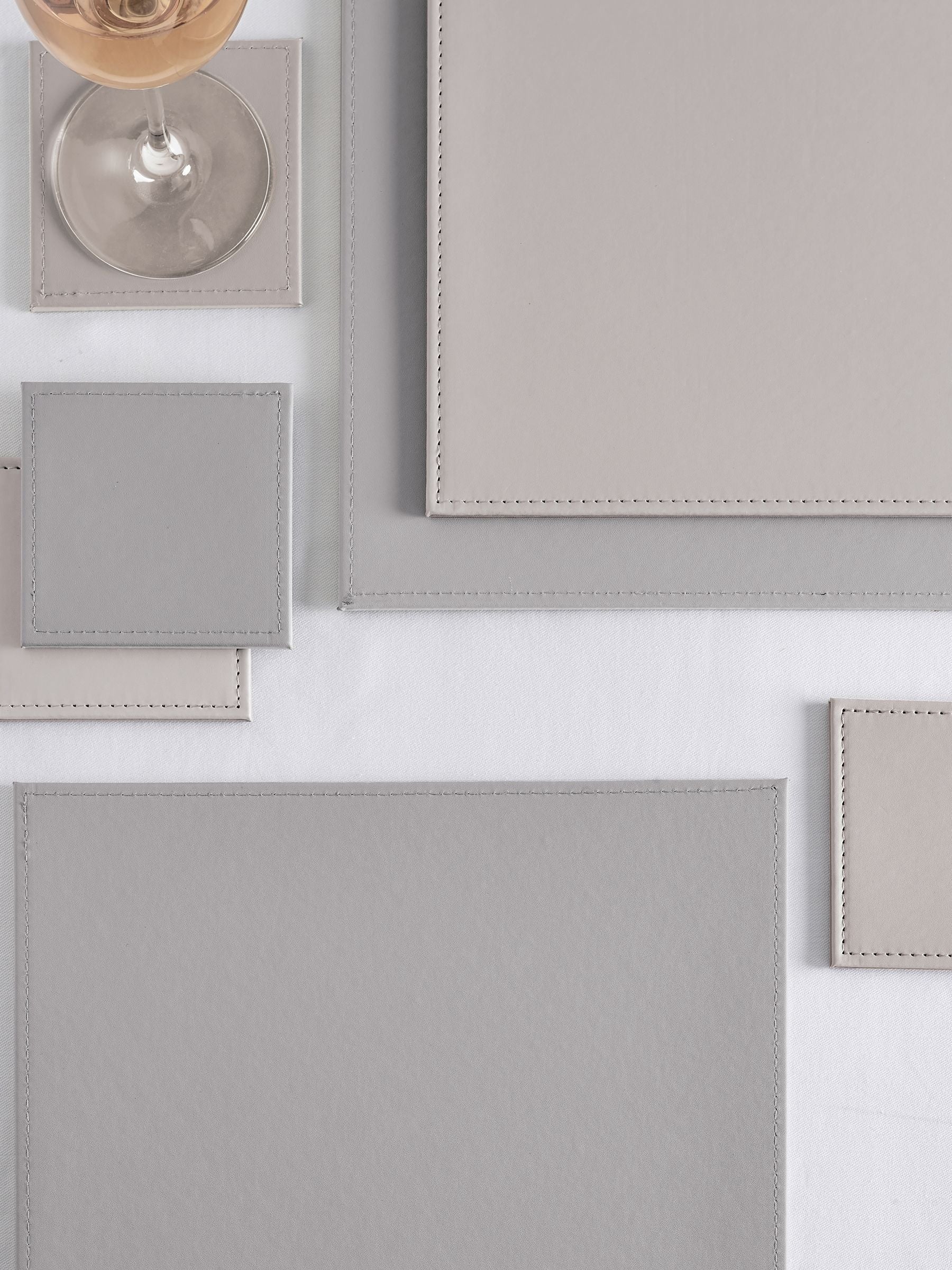 Set of 4 natural reversible faux leather placemats and coasters (British brand)