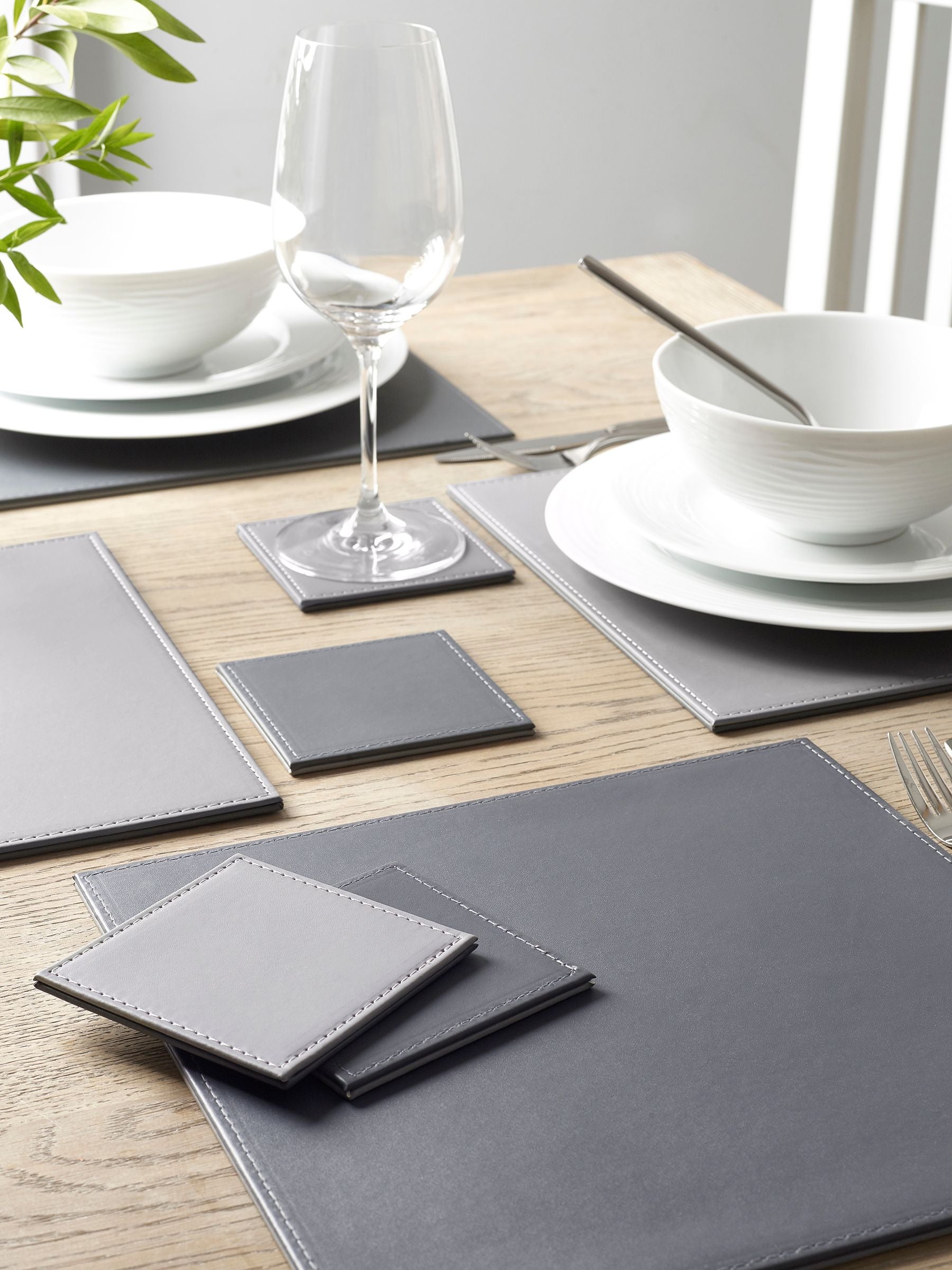 Charcoal grey reversible faux leather placemats and coasters set of 4 (British brand)