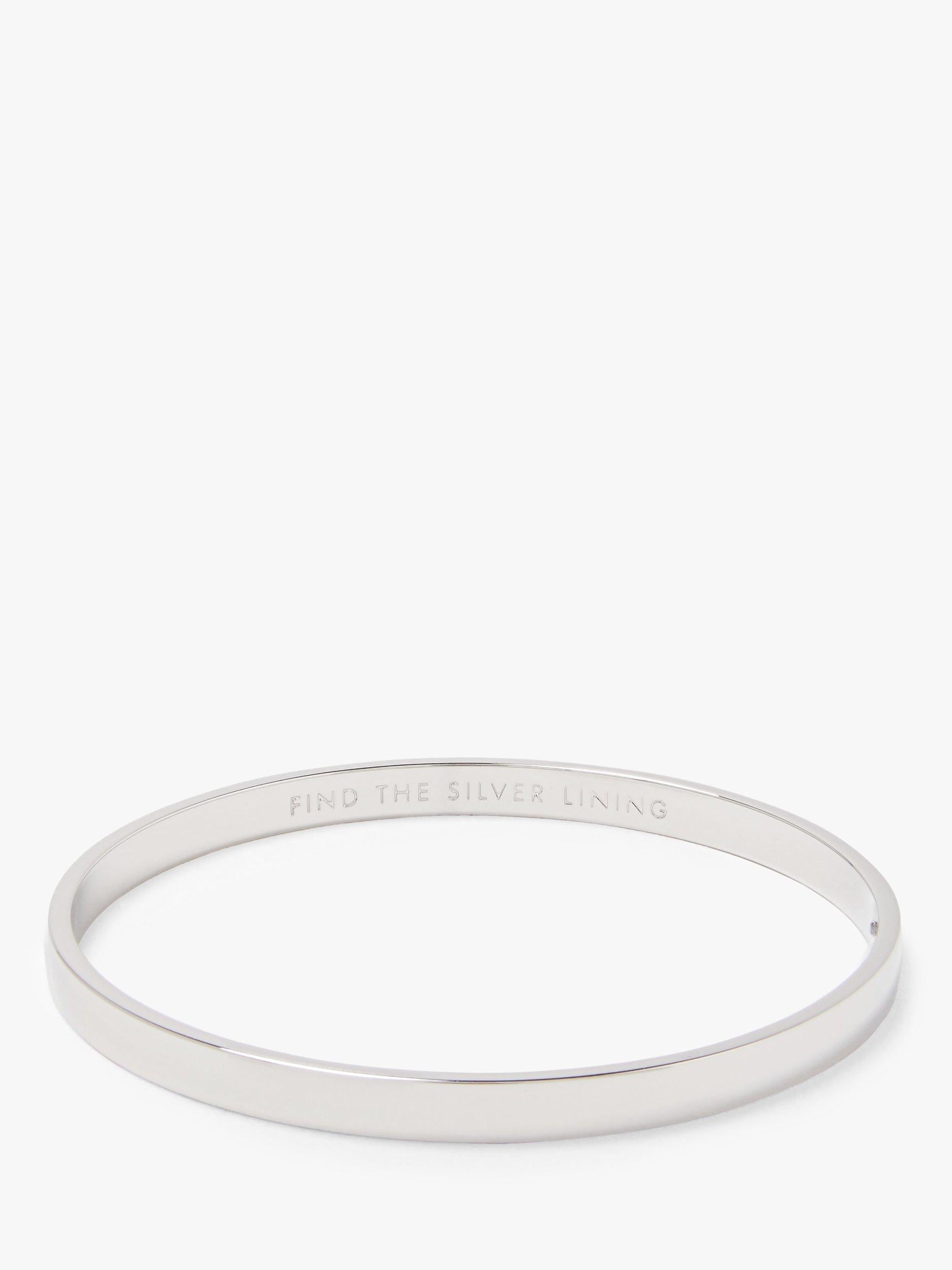 kate spade new york silver bangle with 'Find the Silver Lining' inscription, UK version