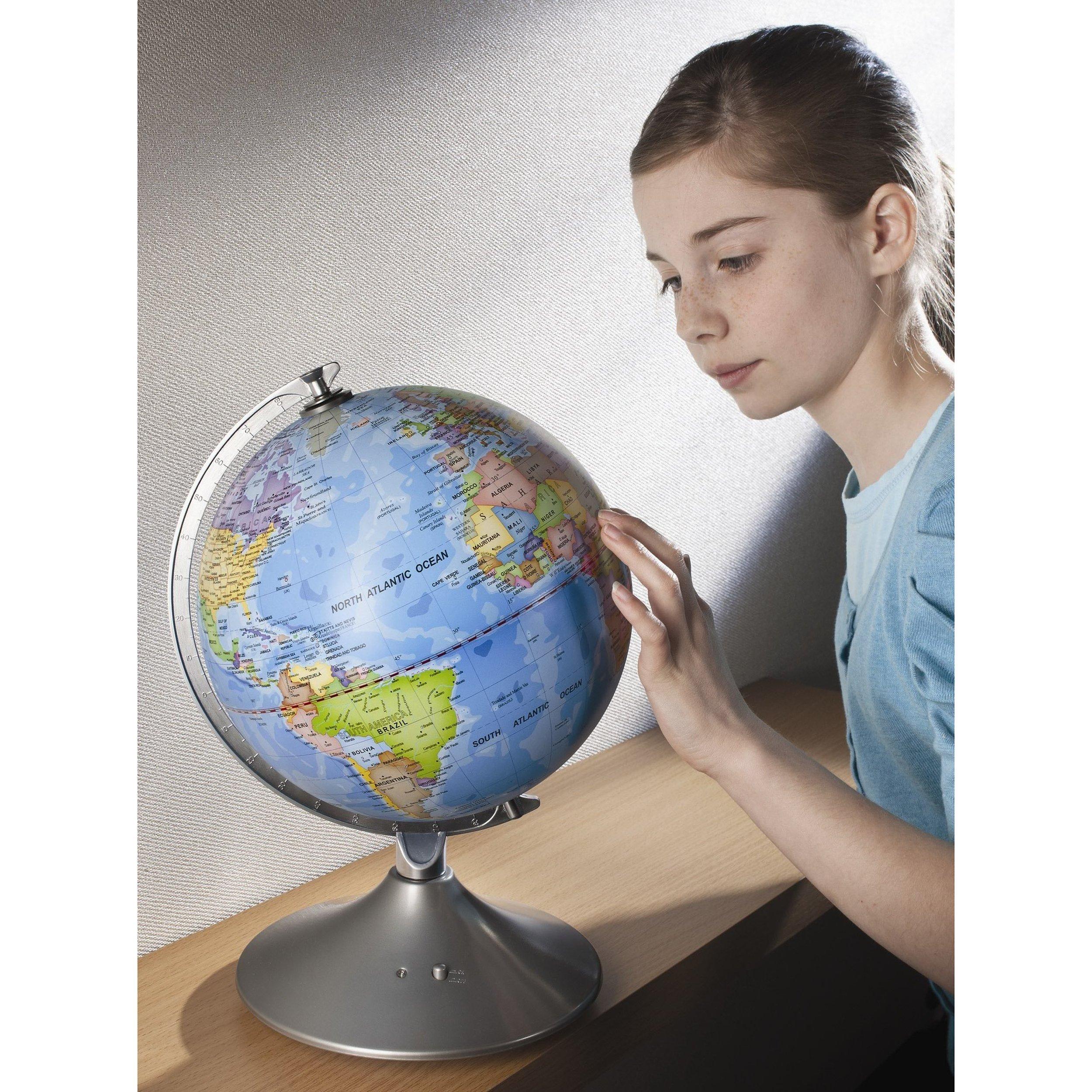 Illuminated Earth and constellations globe showing world map and stars - British product
