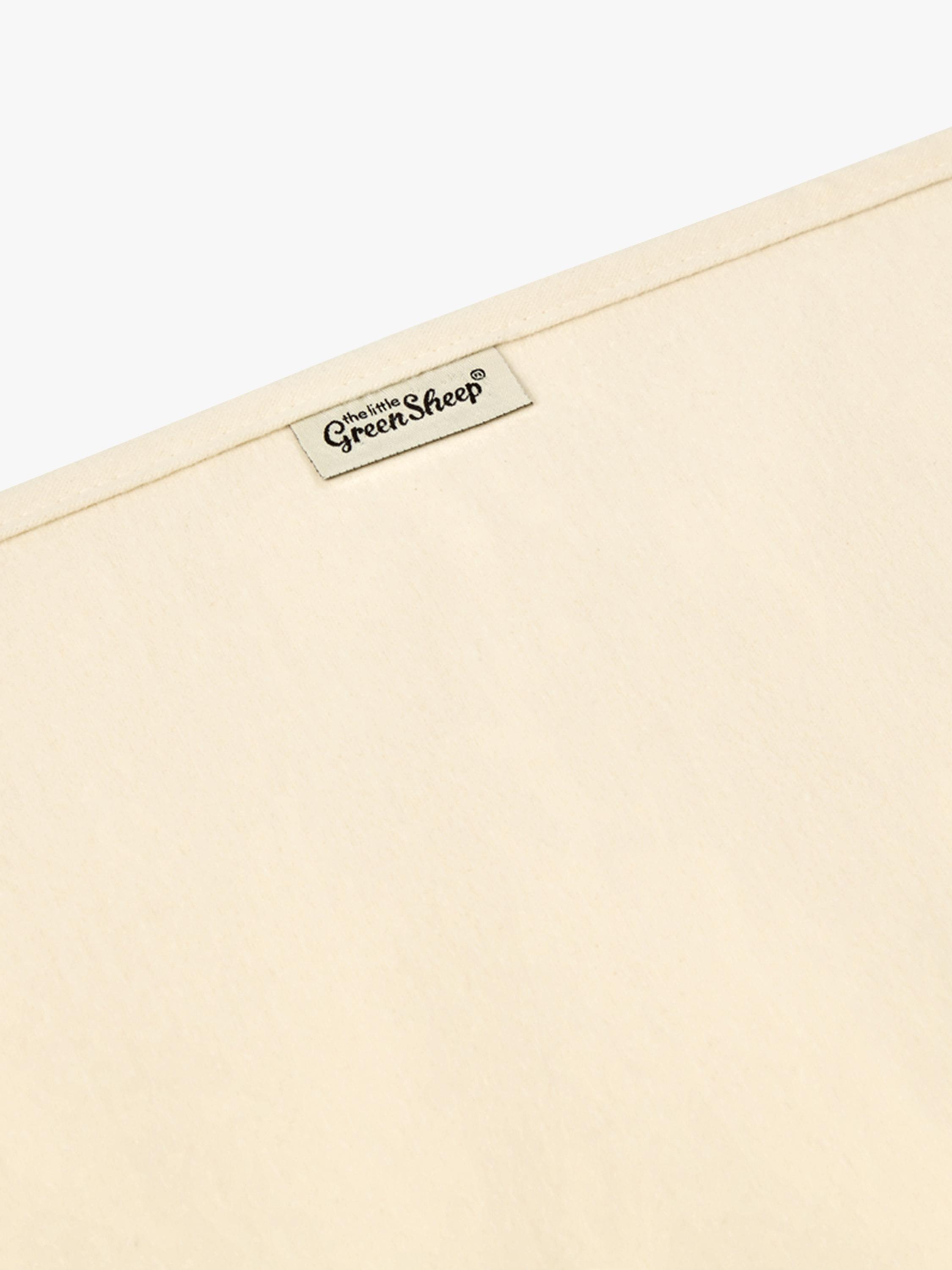 The Little Green Sheep waterproof cotbed mattress protector (British brand)