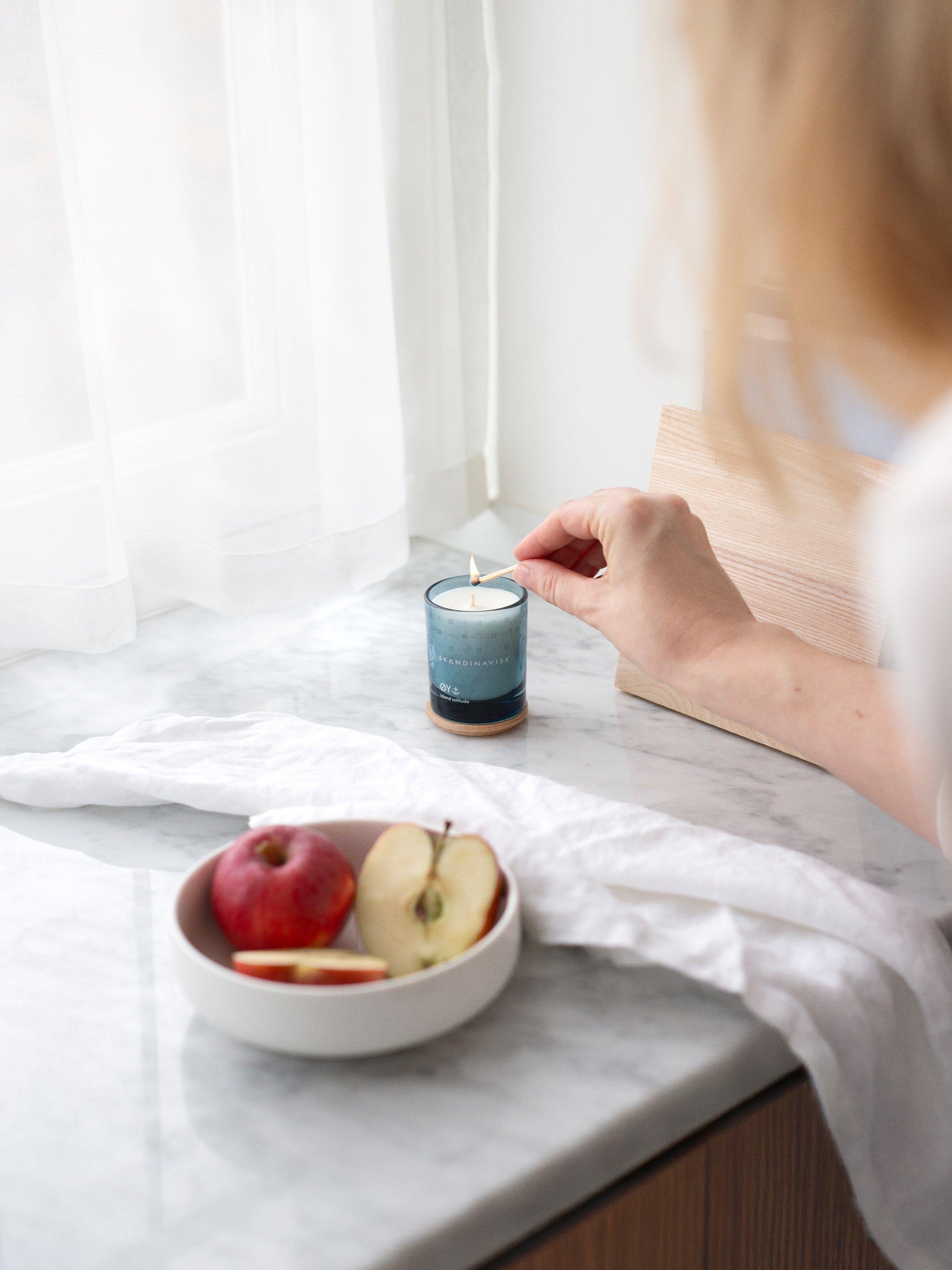 Skandinavisk ØY scented candle with crabapple and dog rose notes, 65g (British brand)