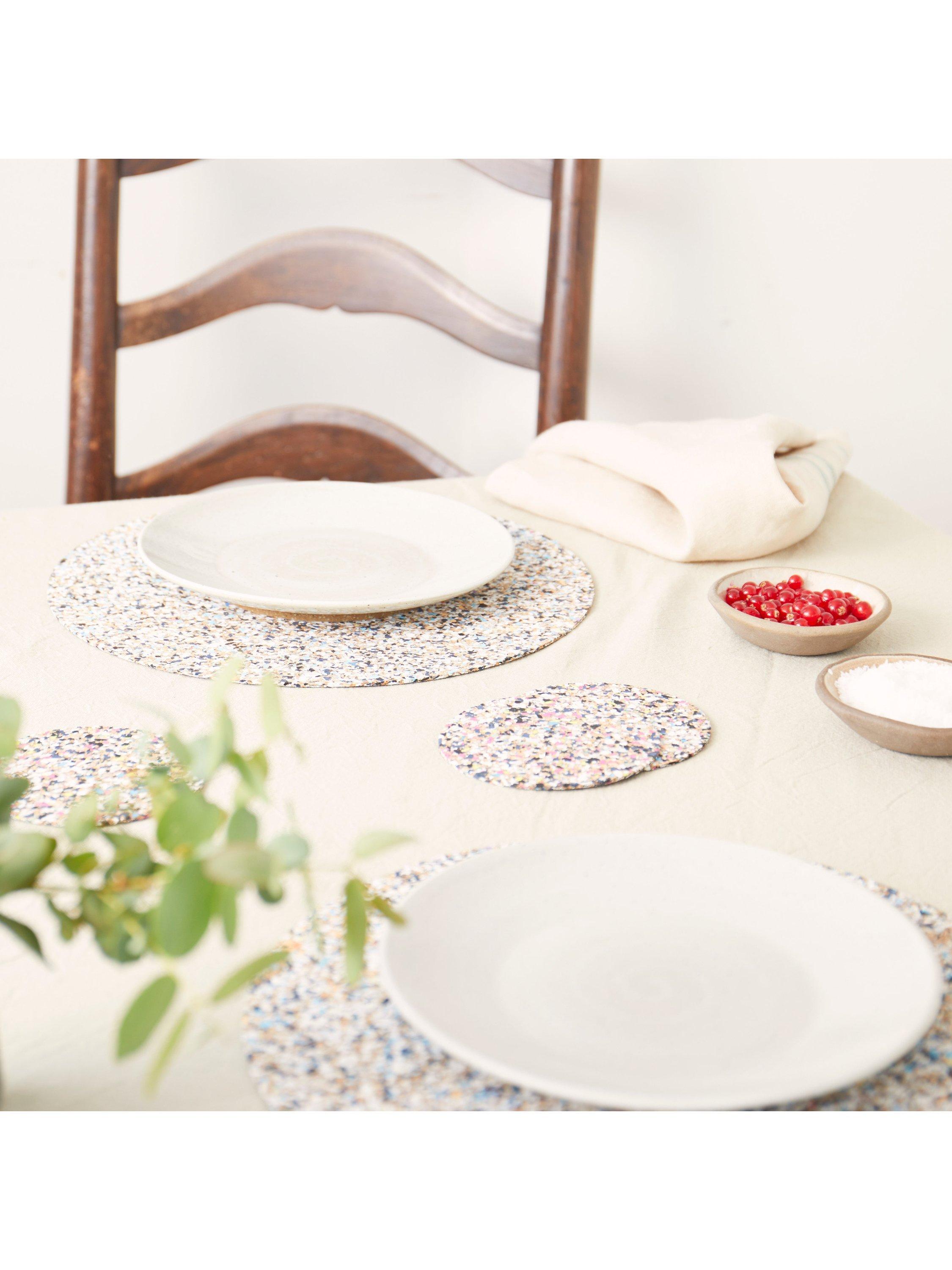 Set of four round cork coasters with recycled plastics by LIGA, UK version
