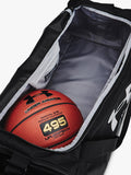Under Armour medium duffel bag with water-resistant finish and multiple pockets (British brand)
