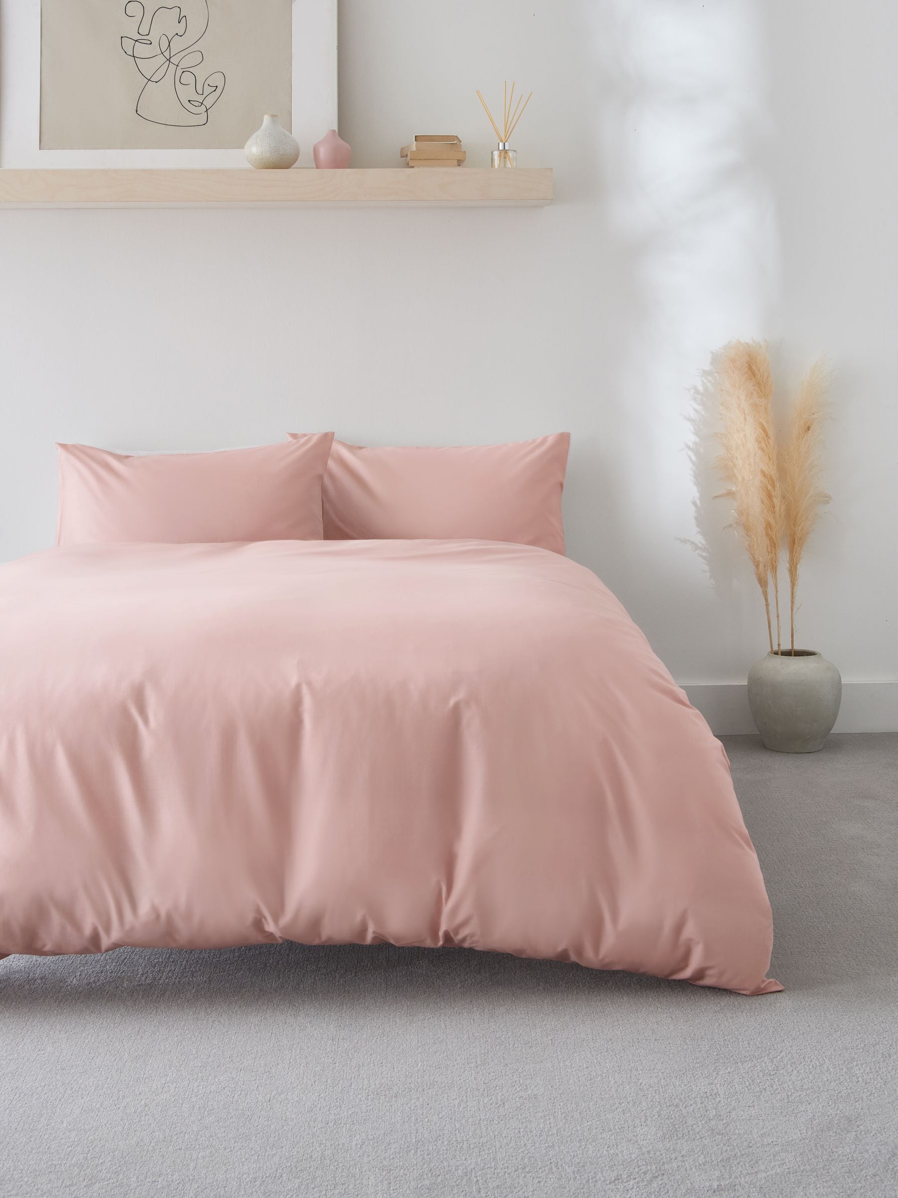 Pink polycotton duvet cover and pillowcase set, imported from the UK