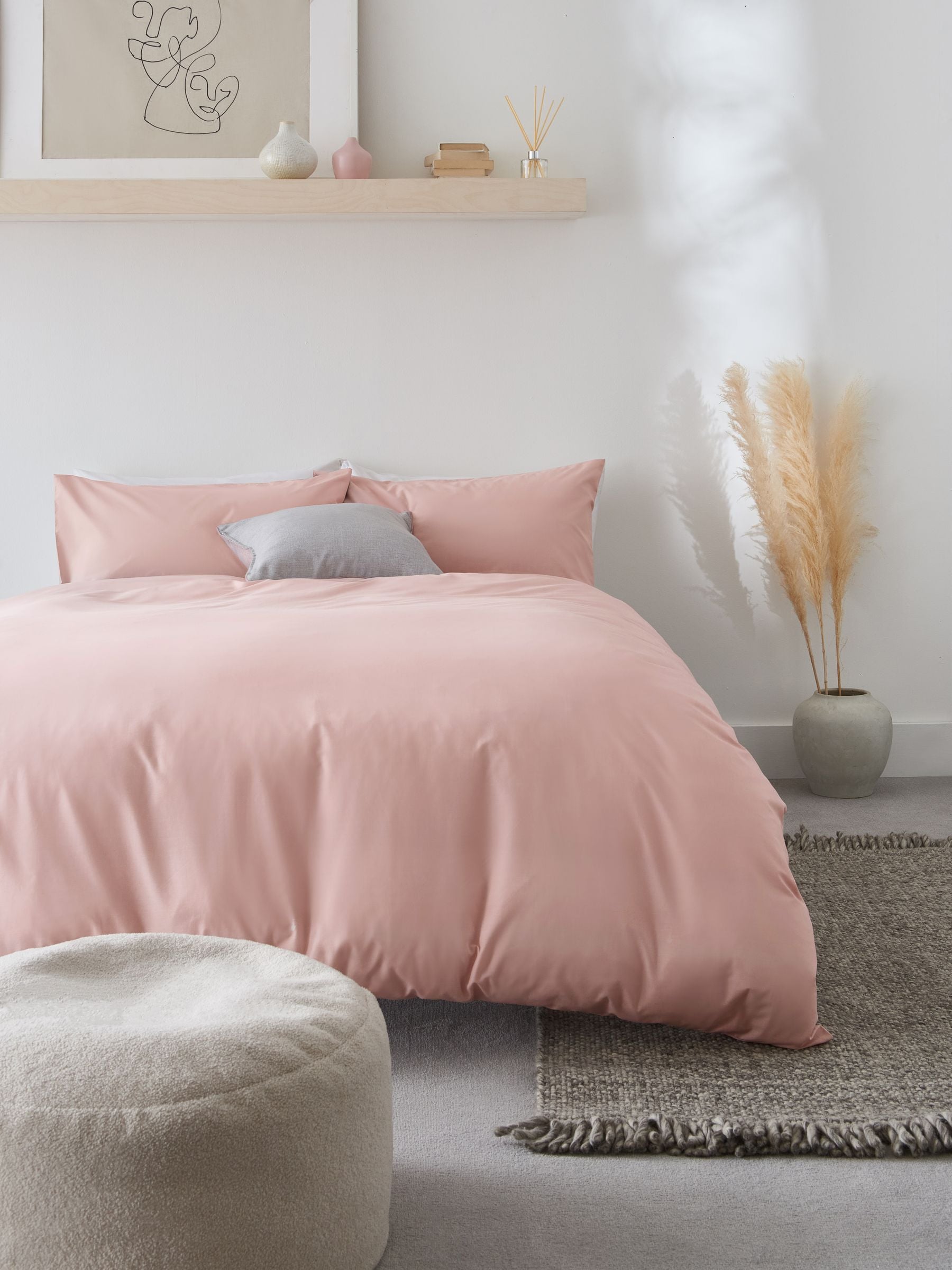 Pink polycotton duvet cover and pillowcase set, imported from the UK