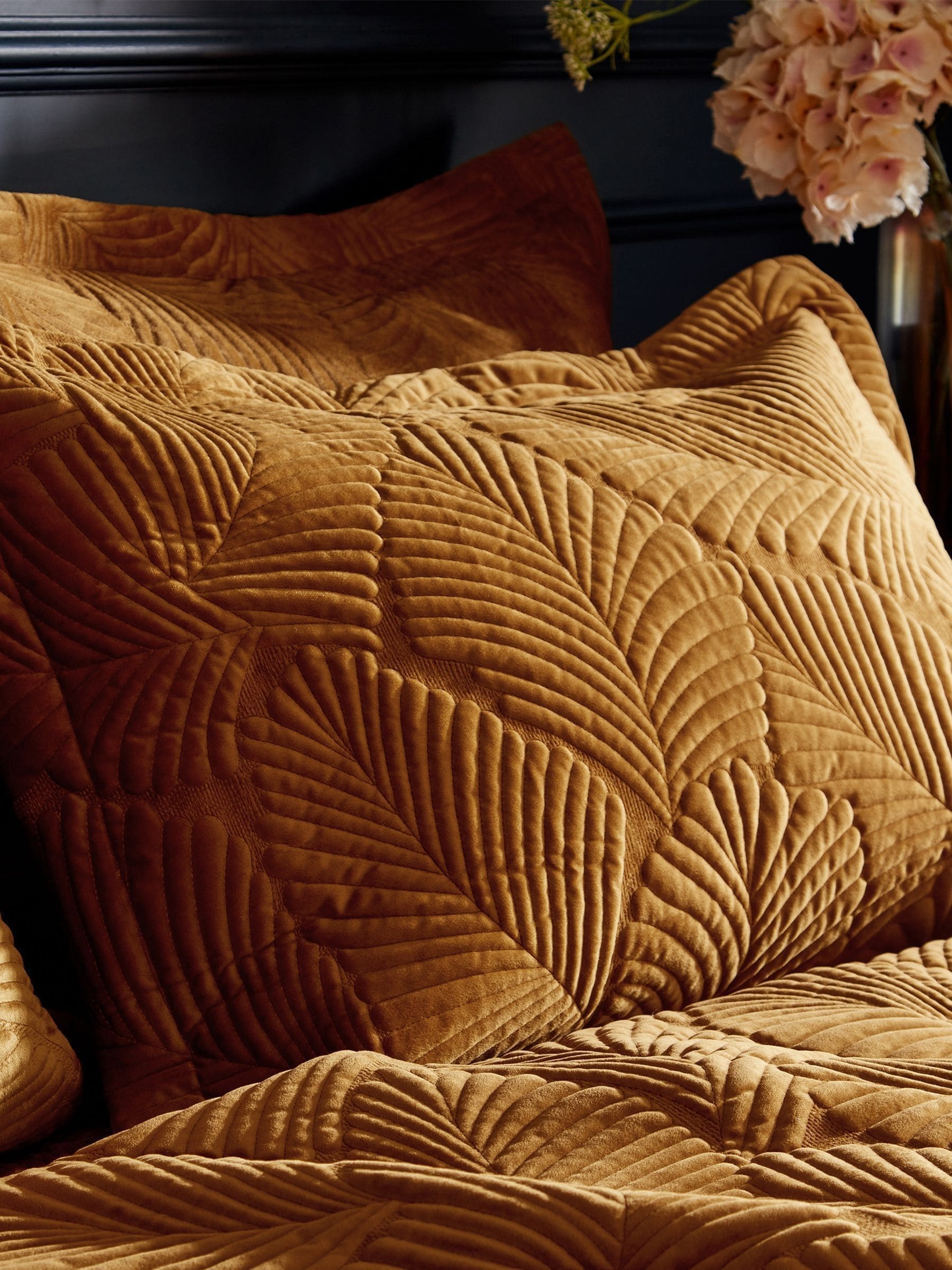 Paoletti gold quilted velvet duvet cover and pillowcase set, imported from the UK