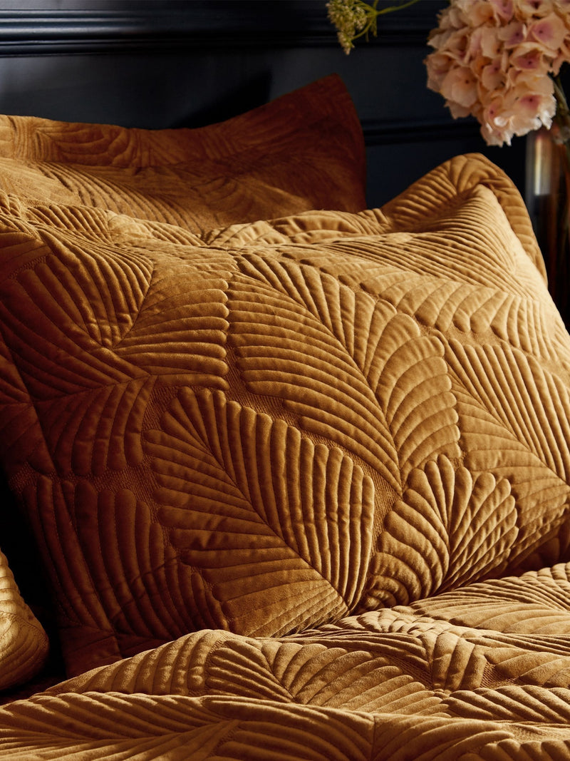 Paoletti gold quilted velvet duvet cover and pillowcase set, imported from the UK