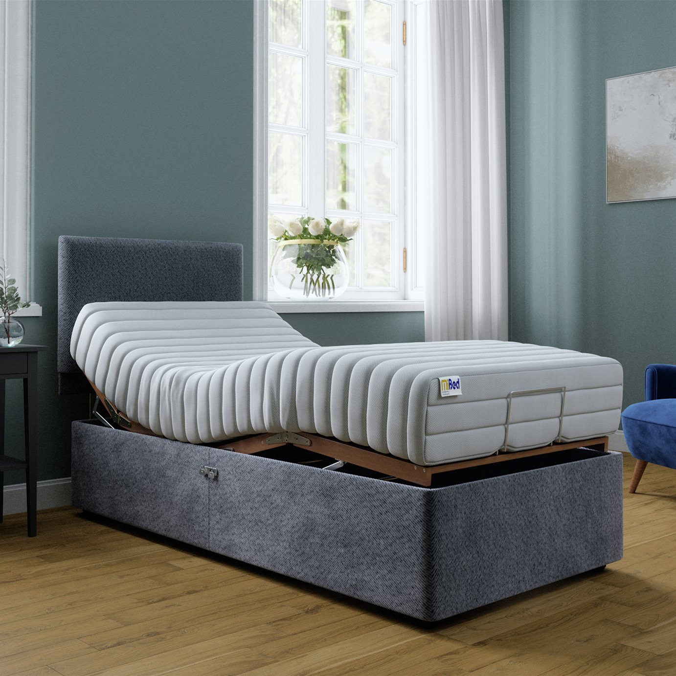 Grey single adjustable bed with memory foam mattress, imported from the UK