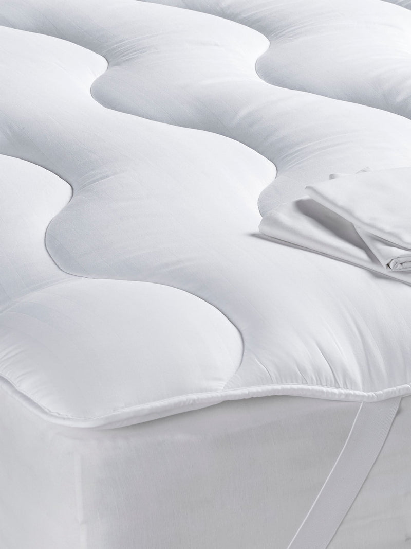 White mattress topper with dual layer design (British brand)