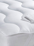 White mattress topper with dual layer design (British brand)