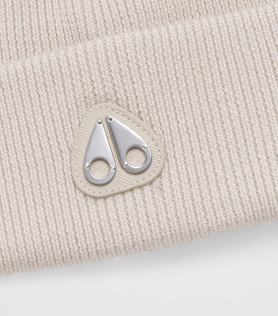 Moose Knuckles kids wool beanie with metal logo patch, imported from the UK