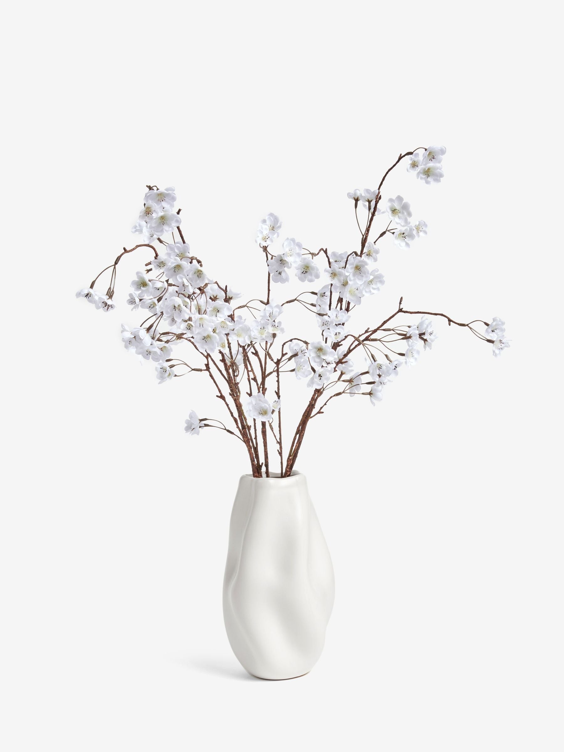 Artificial blossom stem arrangement in white ceramic vase 71cm height - British product