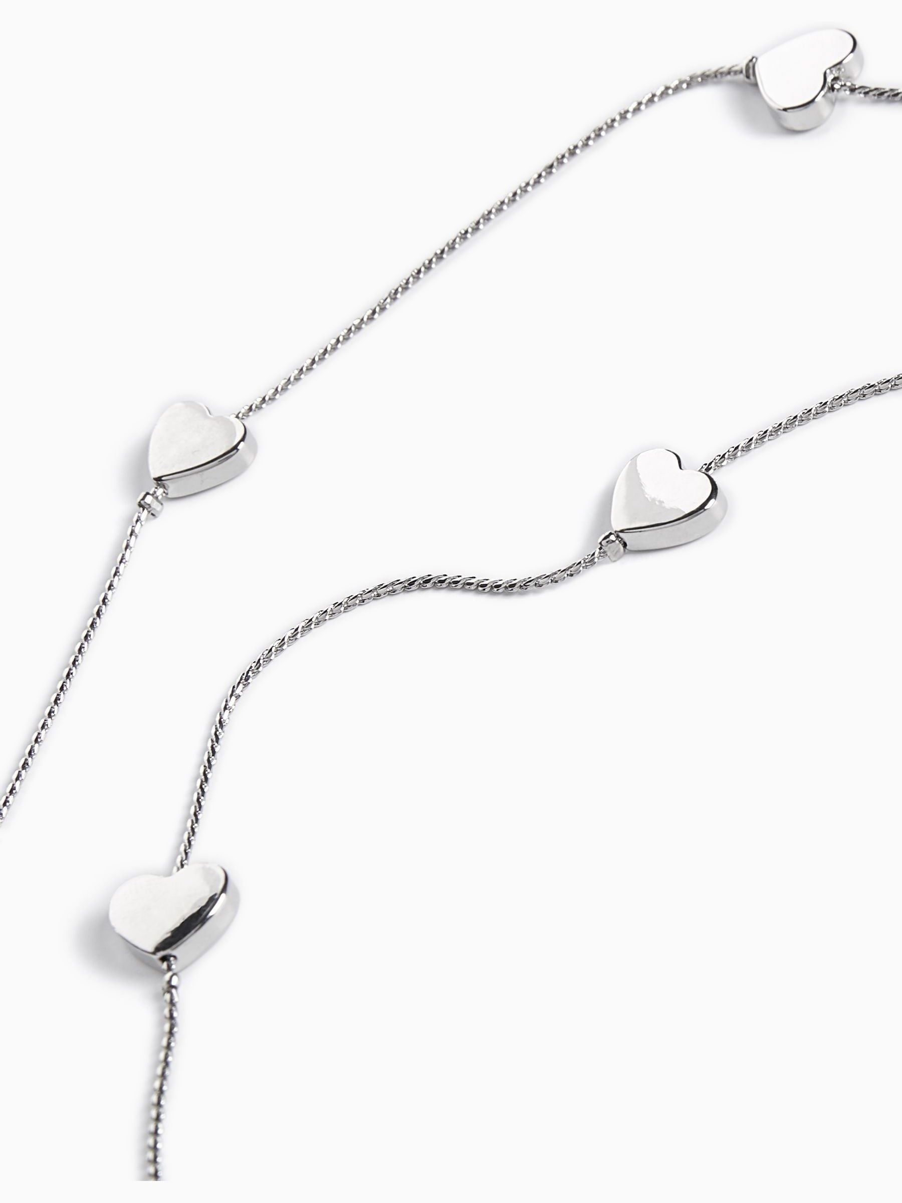 Silver tone heart long rope necklace (British brand)