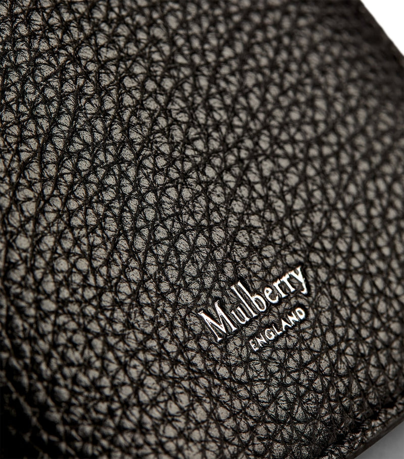 Mulberry grained leather passport holder with slimline design, imported from the UK