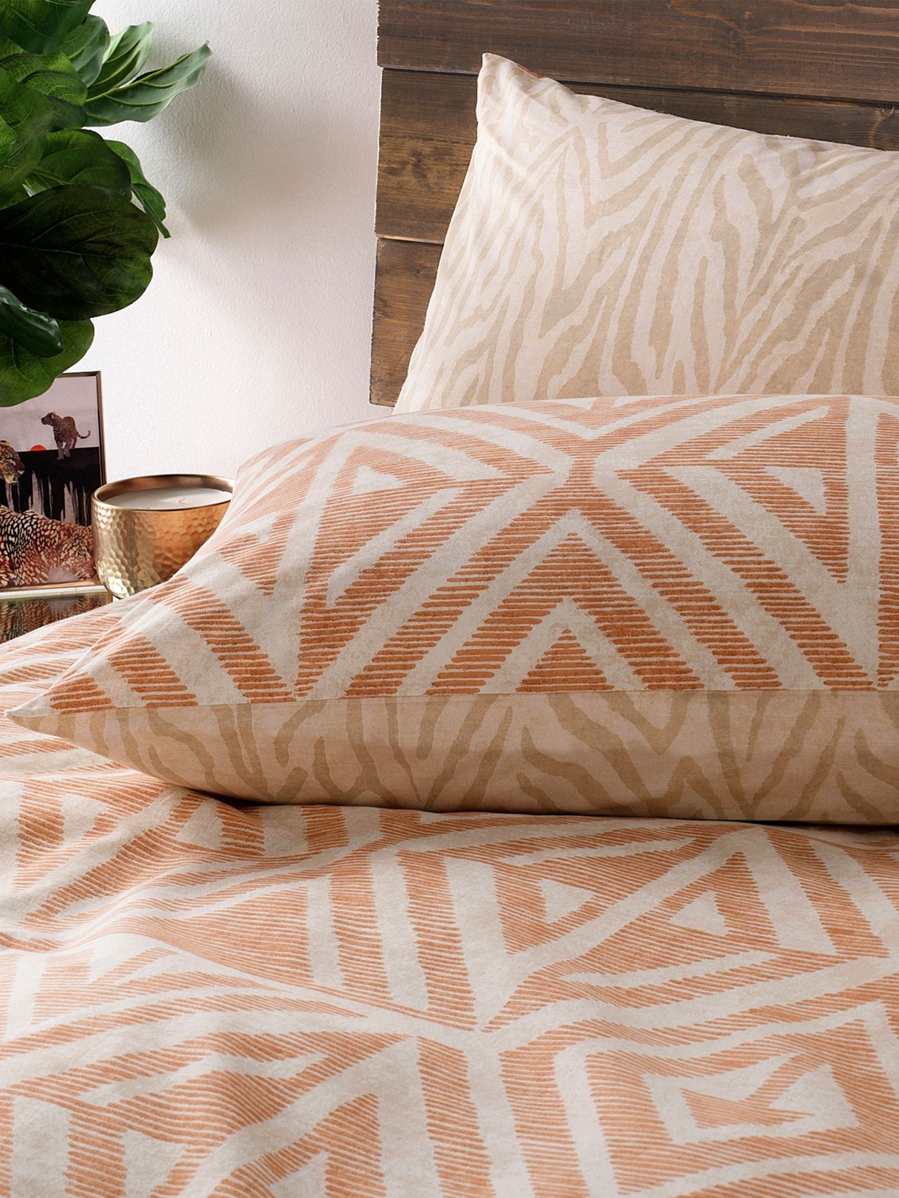 Terracotta orange reversible duvet cover set with Tanza design - British product