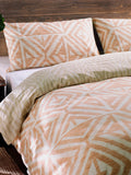 Terracotta orange reversible duvet cover set with Tanza design - British product