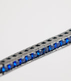 Tateossian tennis bracelet with blue spinel stones (British brand)