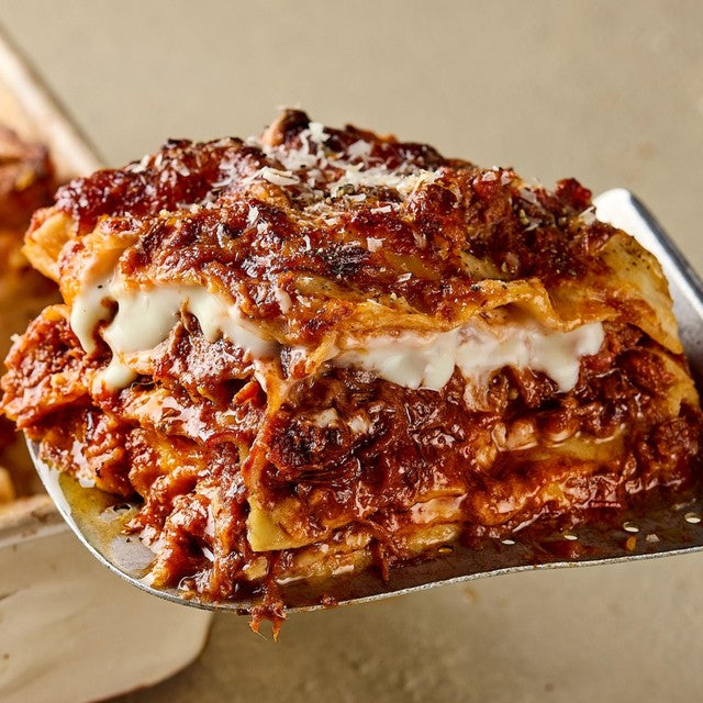 Pasta Evangelists beef lasagne ready meal 385g, imported from the UK