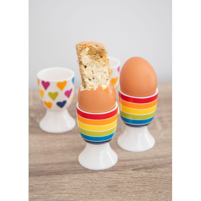 KitchenCraft ceramic egg cup set with rainbow stripes and heart pattern, UK version