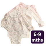 M&S girls floral bodysuit ivory 6-9 months, imported from the UK