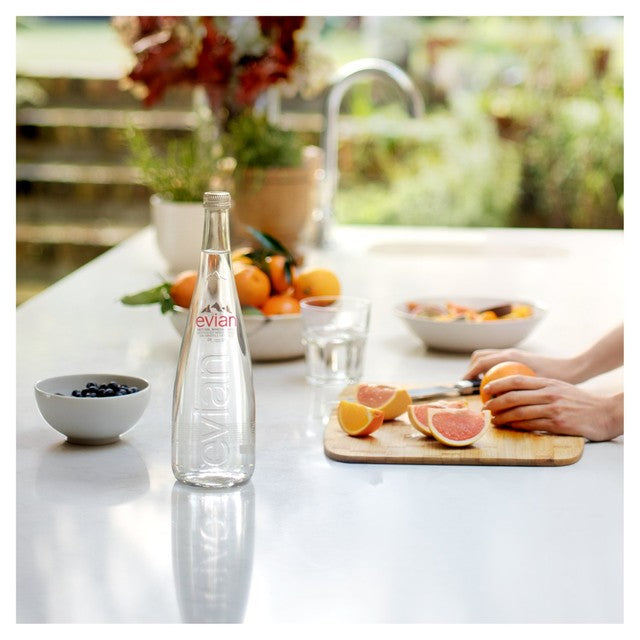 Evian still mineral water 750ml glass bottle - British product