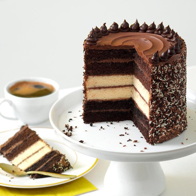 M&S milk, dark and white chocolate sponge cake 1.4kg, imported from the UK