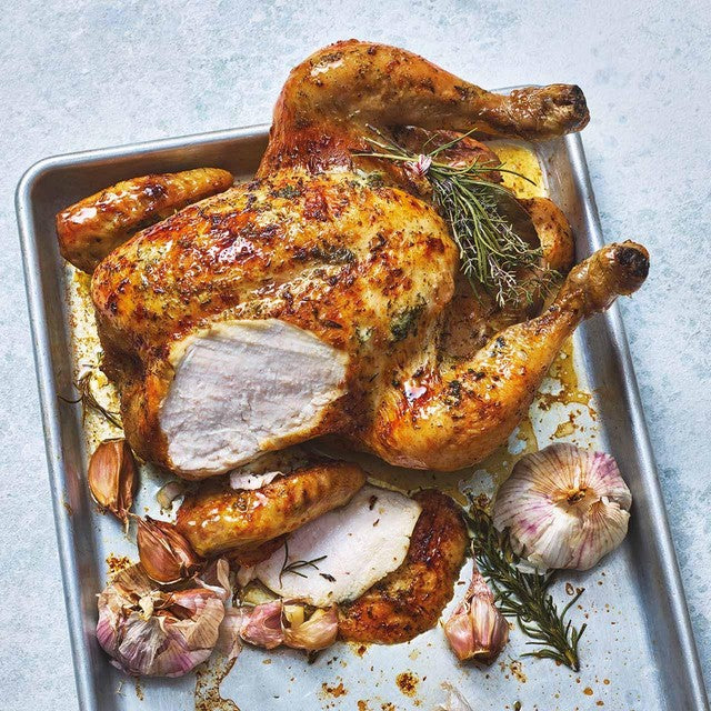 M&S garlic and herb whole chicken 1.55kg, imported from the UK