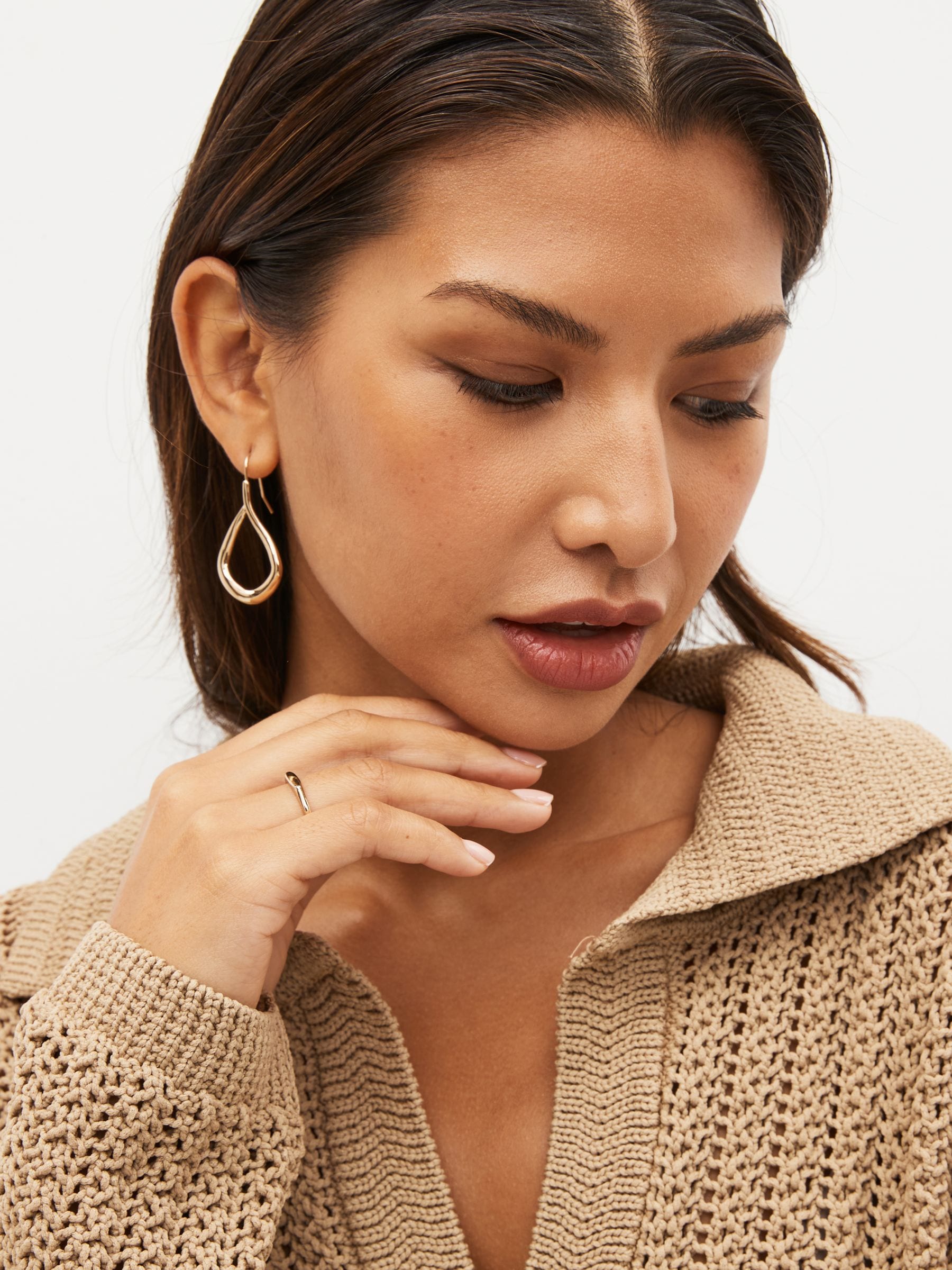 Gold tone tear drop earrings, UK version