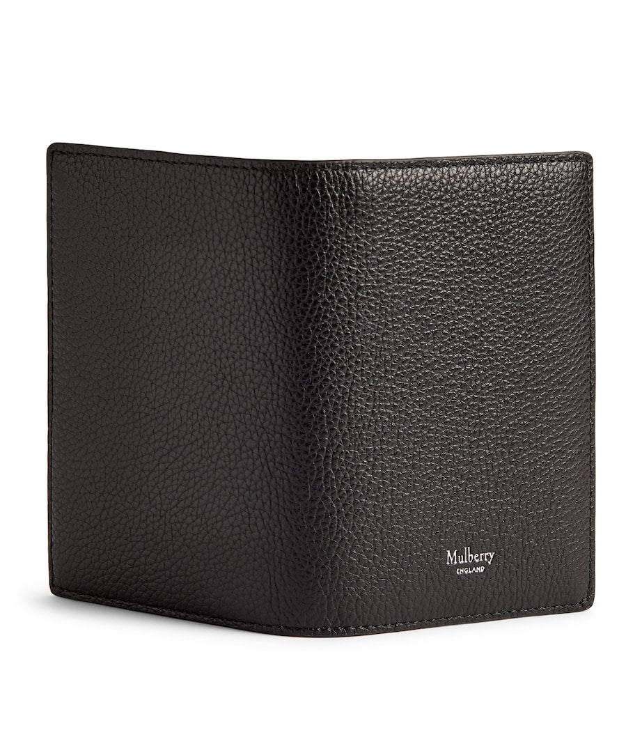 Mulberry grained leather passport holder with slimline design, imported from the UK