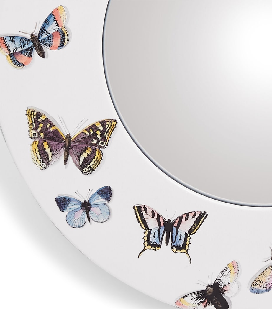 Fornasetti convex wall mirror with butterfly border, 50cm diameter - British product