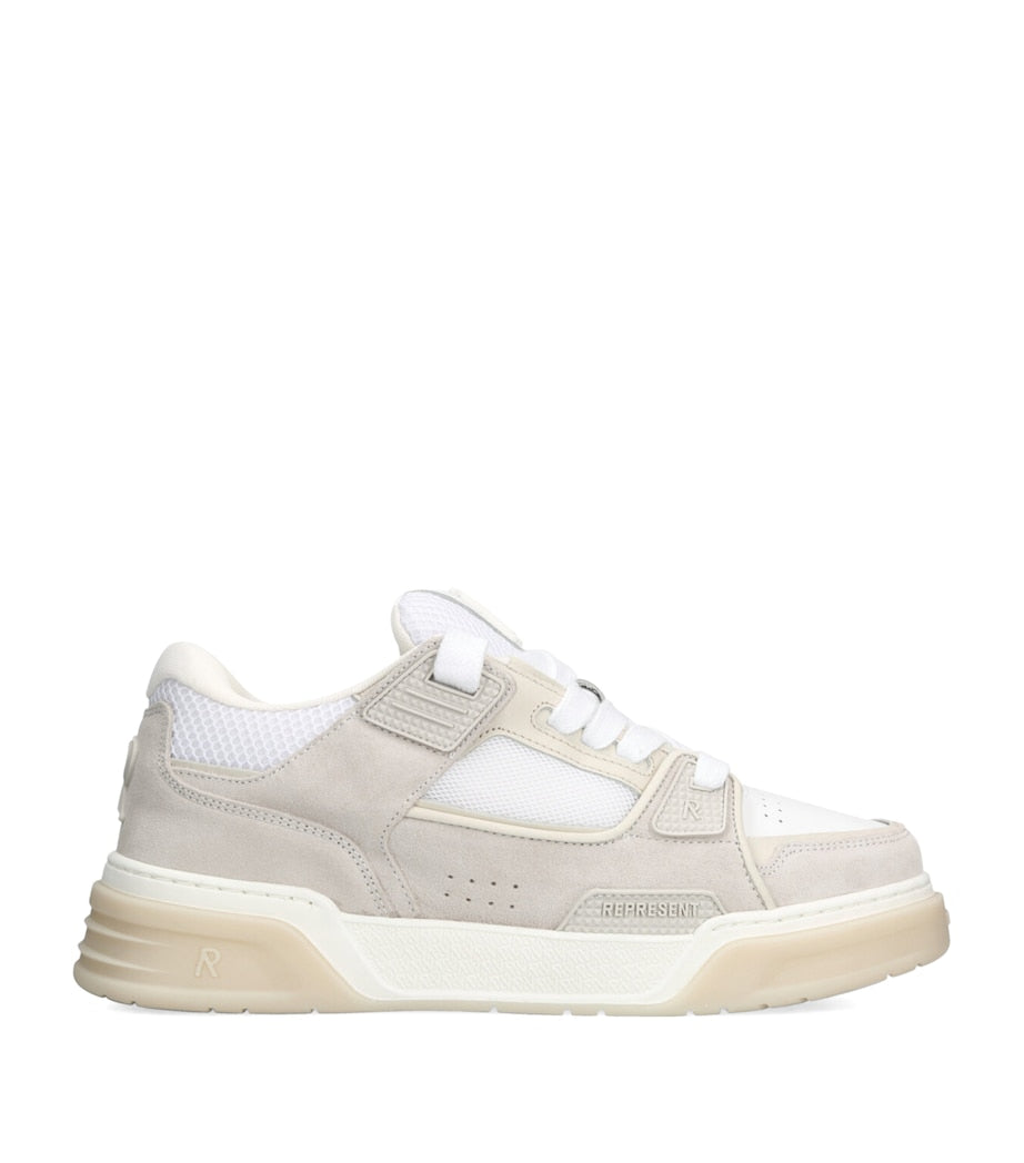 Represent sneakers with leather upper and rubber sole, imported from the UK