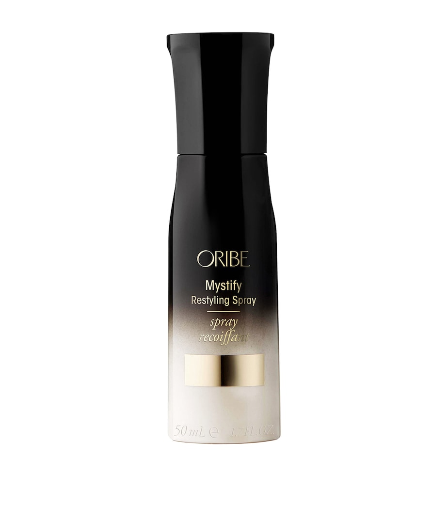 Oribe Mystify Travel Size Restyling Spray 50ml, imported from the UK