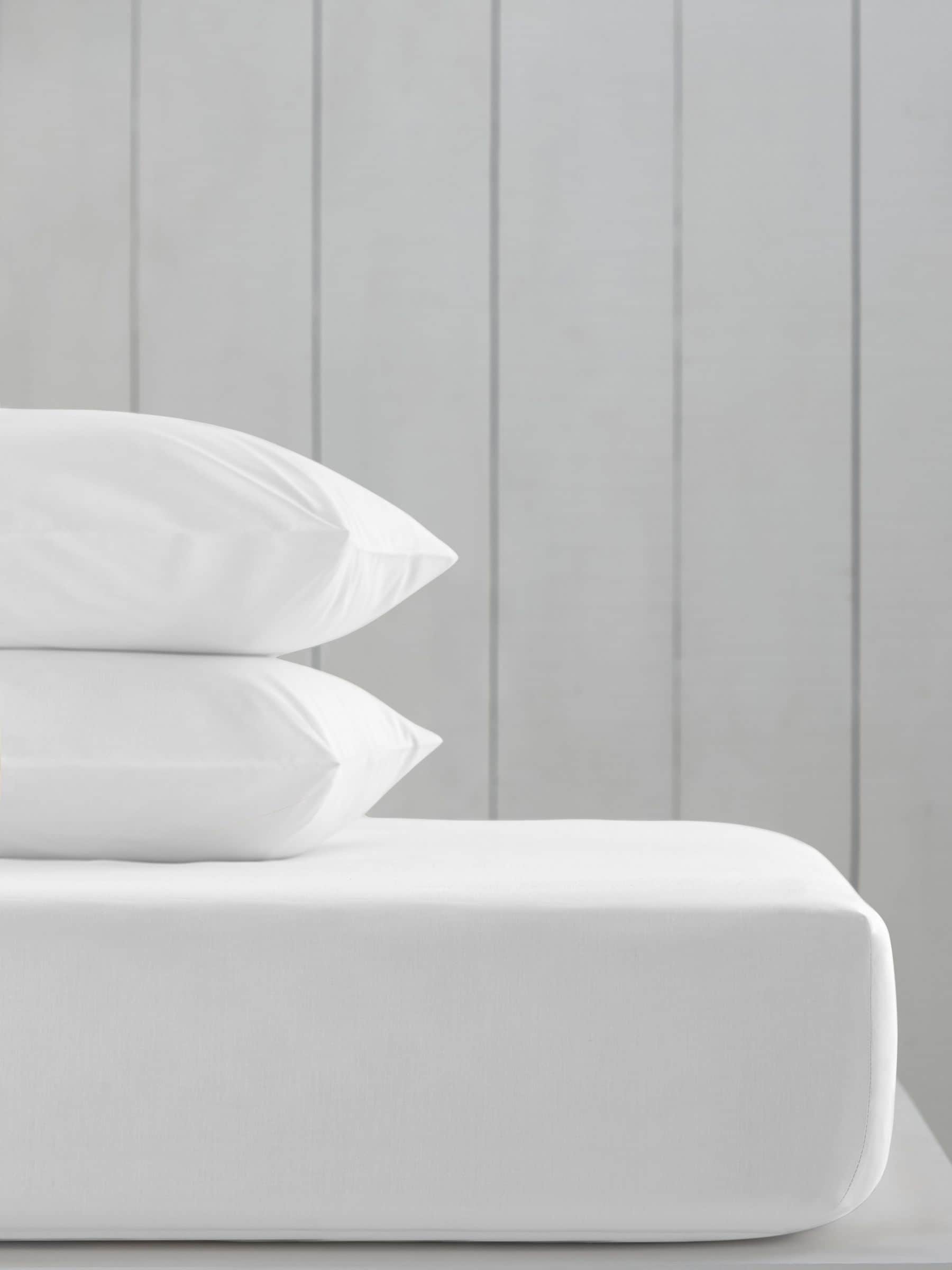 White cotton-rich flat bed sheet (British brand)
