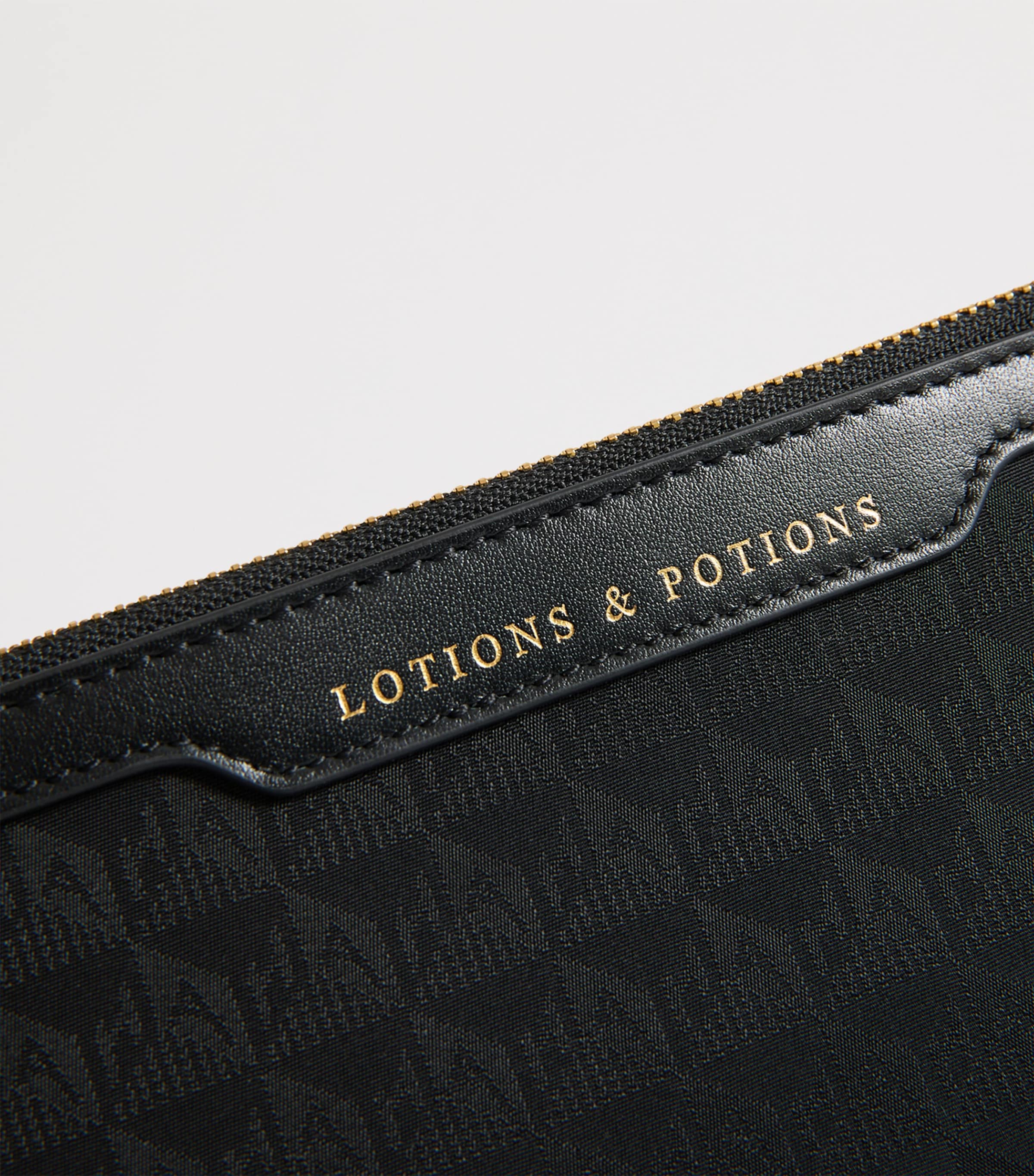 Anya Hindmarch Jacquard Logo Lotions and Potions travel pouch - British product